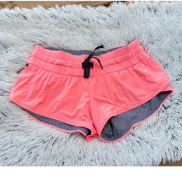 lululemon athletica Pants - Lululemon Gray Pink Reversible Shorts EUC Size 4